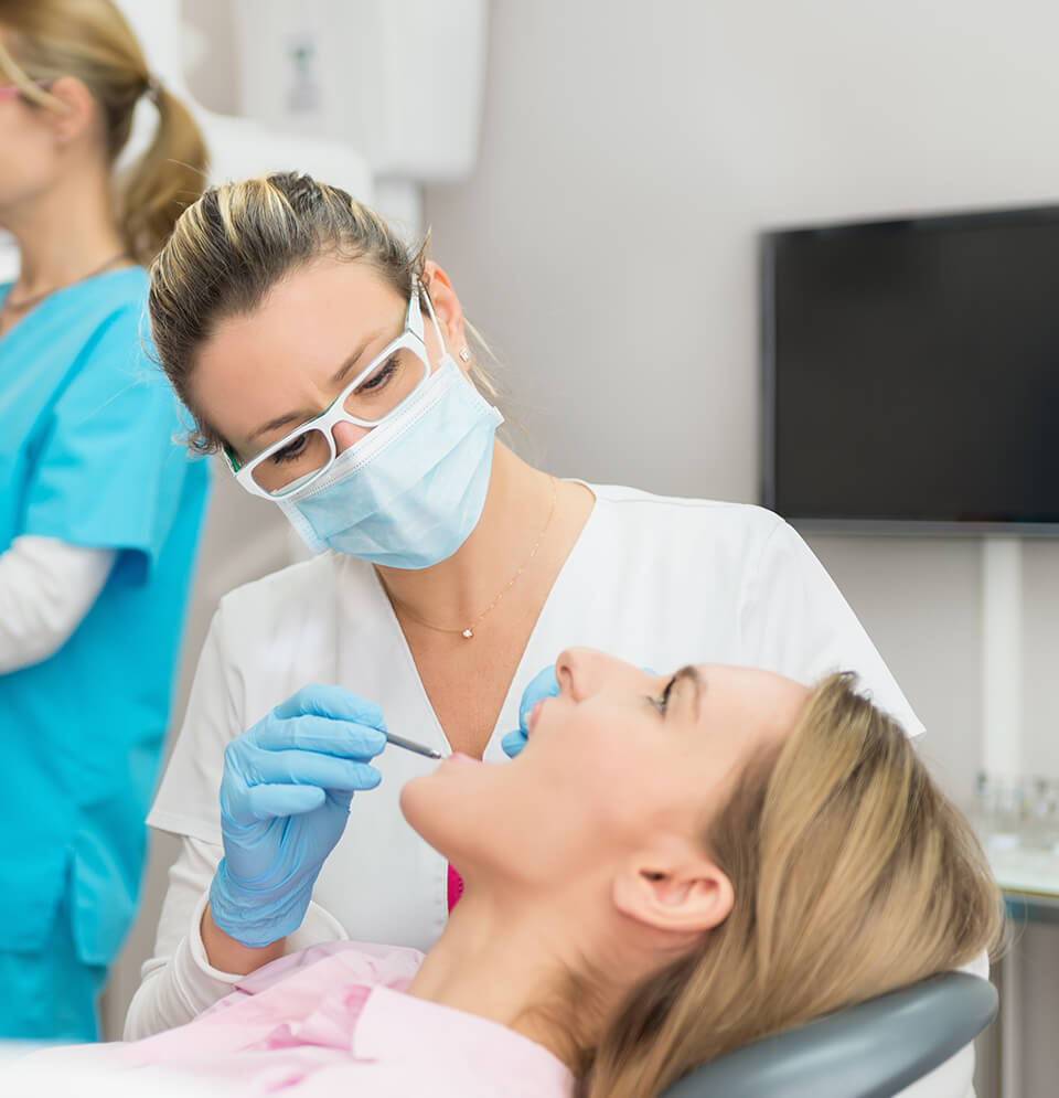 woman receiving a dental exam