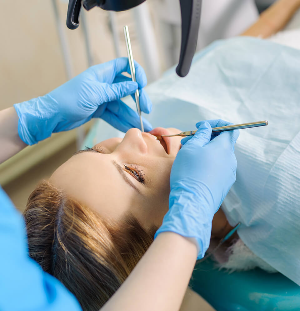 woman receiving a dental exam